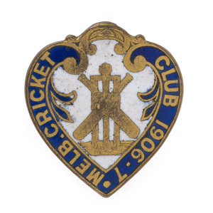 MELBOURNE CRICKET CLUB, 1906-7 Membership badge, made by Stokes; No.99. A rarely seen adaptation of the fob, this badge has a slightly modified design at the top and has an additional "leg" on the back to facilitate wearing on the lapel.