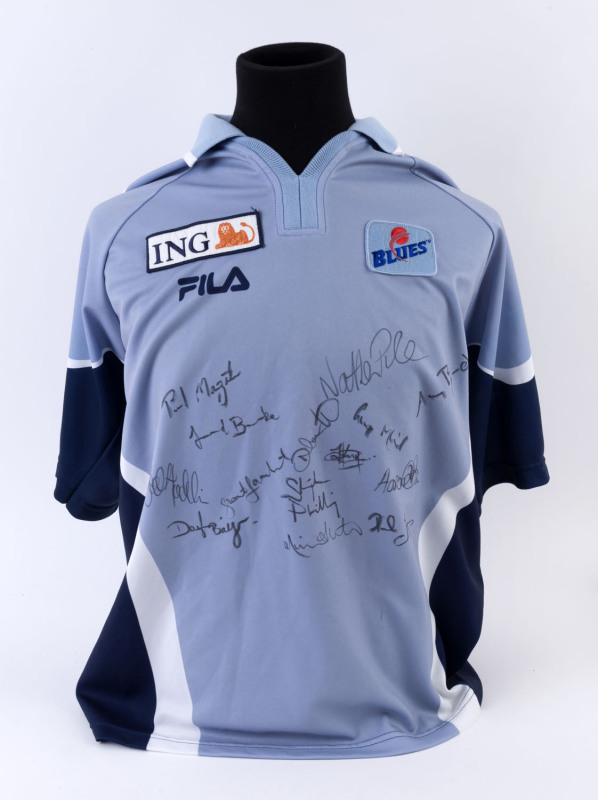 c.2003 unworn NSW cricket shirt signed by numerous players including Doug Bollinger, Brad Haddin, Michael Slater, Phil Jaques, Aaron Bird, & Aaron O'Brien.