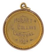 THE AUSTRALIAN RULES FOOTBALL CARNIVAL, HOBART 1924: The gold medal awarded to "Goldie" Collins, who was part of the winning team from Victoria. The final match - to determine the winner - was a close fought affair between Victoria and Western Australia, - 2