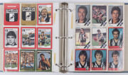 1980s-90s Scanlens & Stimorol cards, haphazardly laid out by club and affixed with cellotape into photo album, comprising Brisbane (6), Carlton (27), Collingwood (25), Essendon (26) Fitzroy (25), Footscray (16), Geelong (27), Hawthorn (29), Melbourne (27 - 2