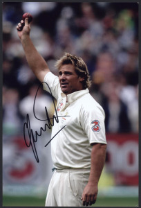 SHANE WARNE: glossy colour photograph of Warne (30 x 20cm), SIGNED BY WARNE, with Sports Legends Ltd CofA (2011).