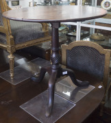 A Georgian mahogany tilt-top table, circa 1780, 70cm high, 75cm diameter