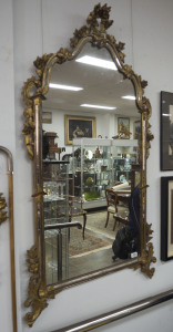 A fine Italian ornate gilt framed mirror, 19th century, ​134 x 73cm