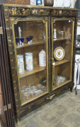 A French bookcase display cabinet with black Chinoiserie finish, circa 1920s, ​173cm high, 140cm wide, 41cm deep