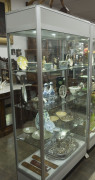 An island display cabinet, aluminium and glass, 21st century, electrified to Australian standards, 201cm high, 101cm wide, 46cm deep