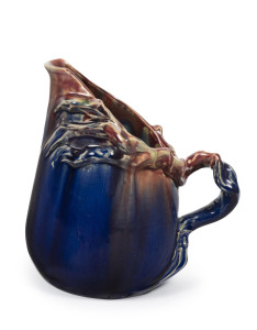 MARGARET KERR pottery jug with applied branches and handle, glazed in pink and blue, circa 1932, rare. Incised signature "Margaret Kerr", note this shape has previously never been recorded, 19cm high