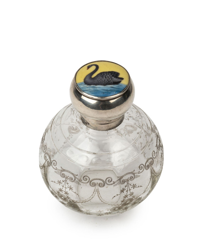 A rare sterling silver topped engraved scent bottle with finely enamelled black swan on the lid, made in Birmingham, circa 1908, with original stopper, 12cm high