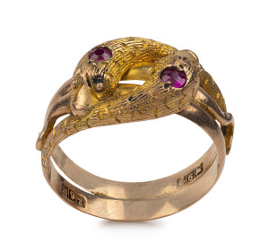 An Australian Colonial 9ct gold ring in the form of two entwined snakes encrusted with rubies, 19th century, pictorial maker's marks.