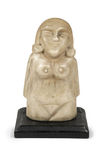 Inuit carved whale tooth statue of a female fertility figure, 19th century, ​9.5cm high