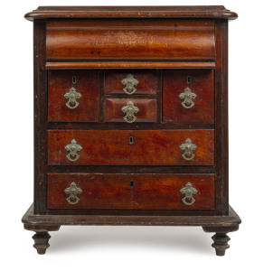 An Australian apprentice chest of seven drawers with nickel plated handles and fine tuned feet, top with remains of original painted decoration, South Australian origin, circa 1880, ​57cm high, 50cm wide, 31cm deep