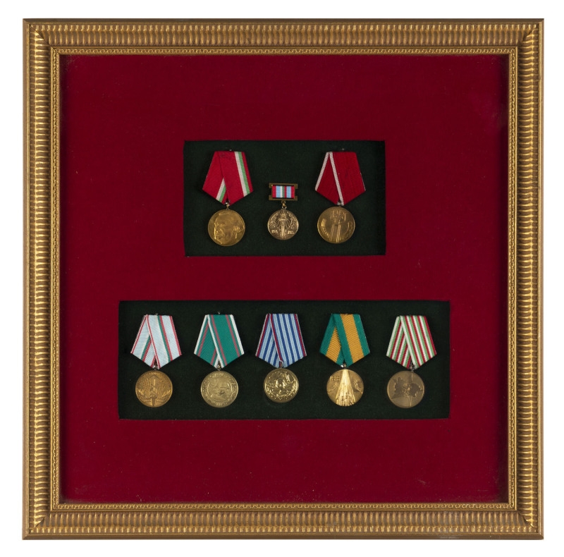 Bulgarian medal display, 8 medals with ribbons attractively mounted and framed, label with details verso, 48 x 48cm overall