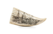 A scrimshaw whale's tooth with whaling scenes, ​12.5cm high - 2