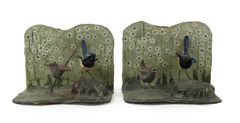 A pair of Australian folk art bookends with fairy wren decoration, painted papier-mâché, late 19th century, ​12cm high, 15cm wide, 12cm deep