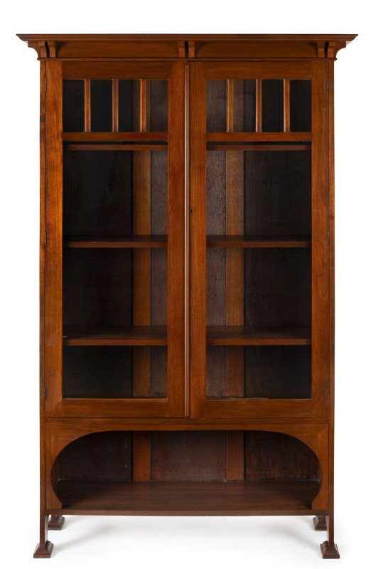 An Australian blackwood two door bookcase with maker's label on the back "COOGAN'S, TASMANIA", early 20th century, 183cm high, 118cm wide, 40cm deep