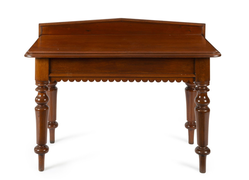 An Australian cedar servery table with palladium back and carved apron, 19th century, ​87cm high, 122cm wide, 63cm deep