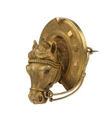 A superb Colonial Australian gold brooch fashioned as a horse's head surrounded by a horse shoe, most likely of Melbourne origin, 19th century, marks rubbed (illegible), 4.5cm high, 4cm wide, 18.5 grams - 2