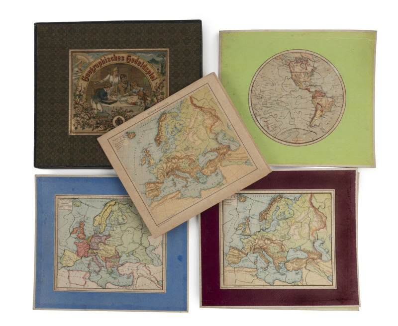 [MAP PUZZLE GAME] "GEOGRAPHISCHES GEDULDSPIEL" c1870, set of 6 engraved dissected puzzles, with a colour printed copy of each map loosely inserted, 28 x 31cm., decorative box with colour lithograph on lid. This lovely German puzzle-game, includes two circ