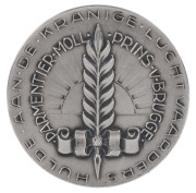 THE LONDON to MELBOURNE MacROBERTSON CENTENARY AIR RACE 1934 Silver medal created to honour the winning entry, the "Uiver", 50mm diameter and depicting the aeroplane, a KLM Douglas DC2 in flight over a map depicting the route (obverse) and with the names - 2