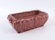 MELROSE WARE pink glazed pottery trough with gumleaf decoration, stamped "Melrose Ware, Australian", ​12.5cm high, 34cm wide