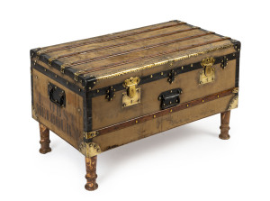 An antique French cabin trunk with stencilled Melbourne destination, converted to coffee table, circa 1880s interior with original lining and labels, ​54cm high, 90cm wide, 51cm deep