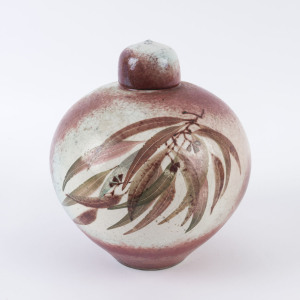 Australian studio pottery lidded vase with gumleaf and blossom decoration, incised signature (illegible), ​23cm high