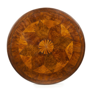 An Australian exhibition sample wood double sided circular table top, inlaid with predominantly Tasmanian timbers including huon pine, musk, myrtle, blackwood and cedar, 19th century, 60cm diameter