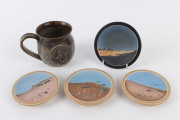 IAN CRAWFORD Australian studio landscape dishes (4), together with a PETER RUSHFORTH pottery mug. (5 items total), the bushfire dish 11cm diameter