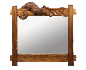 ROBERT PRENZEL mirror, spectacularly carved with brushtail possum, gum nuts and leaves, workshop stamp on reverse "Robt. Prenzel. Toorak Road, South Yarra. European Labour Only" 79 x 80cm