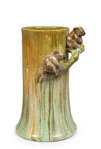 REMUED rare pottery vase with branch handle and two applied koalas, deeply incised and textured tree trunk form, thrown by Allan James with decoration by Castle Harris, incised "Remued 7LB", 23cm high
