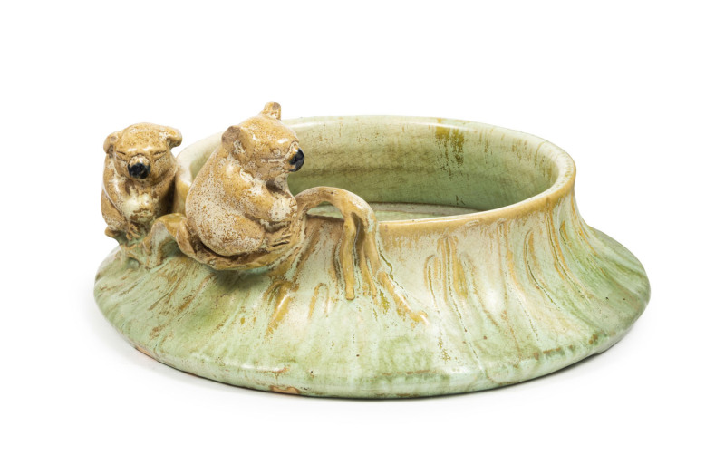 REMUED pottery tree stump bowl with two applied koalas sitting on a branch, incised "Remued 5B", 9cm high, 20cm diameter