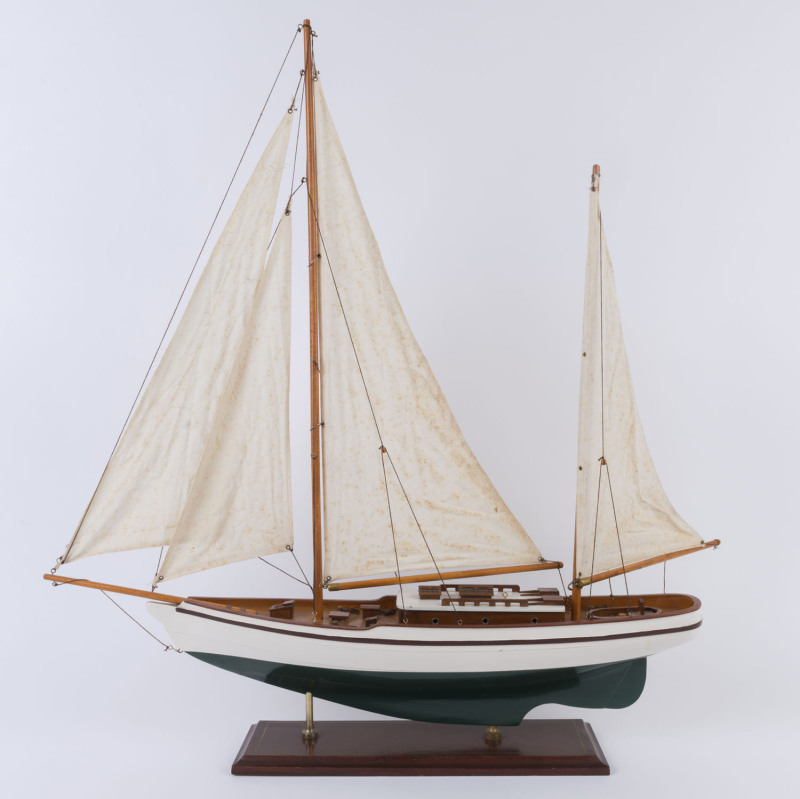 A hand-built model yacht on stand, late 20th century, 78cm high