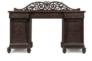 An Anglo-Indian twin pedestal sideboard, ornately carved padouk, early 19th century, 117cm high, 168cm wide, 61cm deep