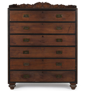 An Anglo-Indian campaign chest of drawers, teak and ebony with carved gallery and brass fittings, early 19th century, 150cm high, 117cm wide, 53cm wide