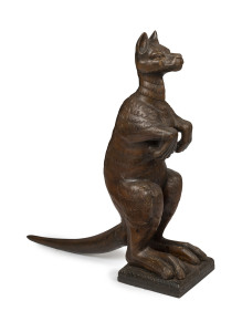 HIGHLY IMPORTANT CARVED WOODEN KANGAROO, CIRCA 1800, A large upright standing primitively carved kangaroo, circa 1790 - 1810, 102cm tall.