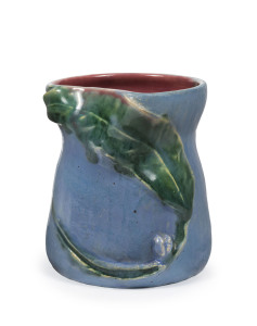 PHILIPPA JAMES pottery vase with applied gum leaf and gum nuts, blue and mauve ground with pink interior, incised "Philippa James", 10.5cm high