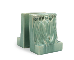 MELROSE WARE rare pair of bookends decorated with gum nuts and leaves, glazed in green, stamped "Melrose Ware, Australian", 14.5cm high