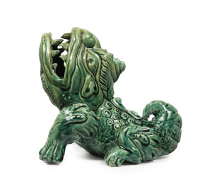 WILLIAM FERRY (VICTORIA ART POTTERY) rare grotesque glazed in green, stamped "W. F. VAP", 14cm high, 15cm long