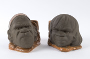 STUDIO ANNA pair of pottery bookends with Aboriginal faces, ​15cm high