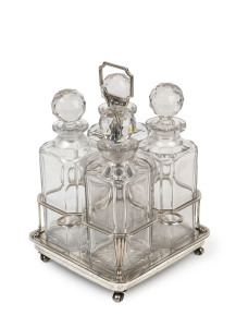 JOHN WILLIAM HALLION, SURGEON SUPERINTENDENT ON THE CONVICT SHIPS "ALEXANDER" in 1816 & "ISABELLA". Sterling silver four bottle decanter stand, made in London in 1806 with accompanying set of four crystal decanters. 29cm high, silver weight 1360 grams.