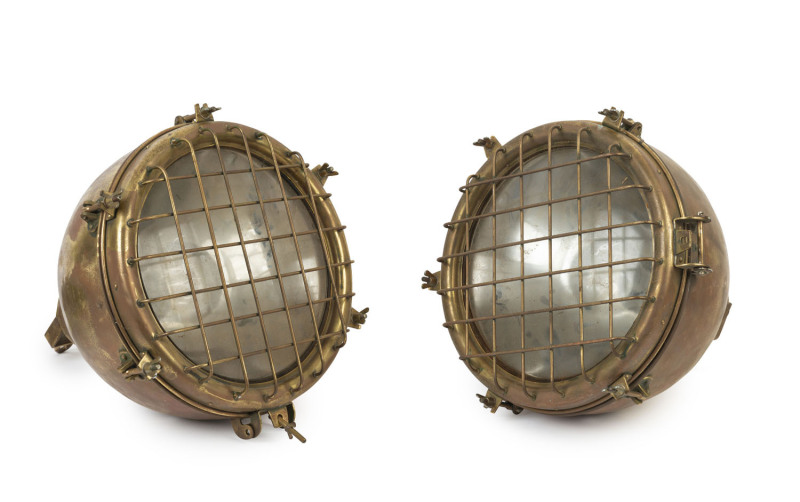 A large pair of maritime spotlights, brass and copper, early 20th century, 52cm high, 42cm wide