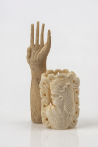 Sailor's whalebone toggle and carved hand, 19th century, (2 items), 3cm and 5.5cm long