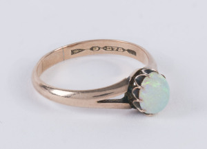 A 9ct rose gold and solid jelly opal ring, late 19th century, stamped (9, 375),