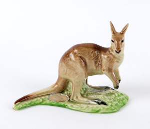 WEMBLEY WARE kangaroo statue, faint factory mark to base plus original foil label, 12cm high, 16cm wide