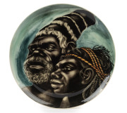 MARTIN BOYD pottery plate with Aboriginal father and son on blue background, incised "Martin Boyd, Australia", 39cm diameter