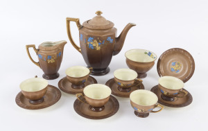 ADA NEWMAN Australian hand-painted porcelain 15 piece coffee set with wildflower motif, N.S.W. origin, signed "A.J. Newman", the pot 18cm high