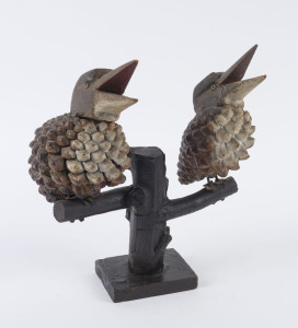 Folk Art kookaburra statue comprising two laughing kookaburras, painted pinecones on timber base, early 20th century, 24cm high