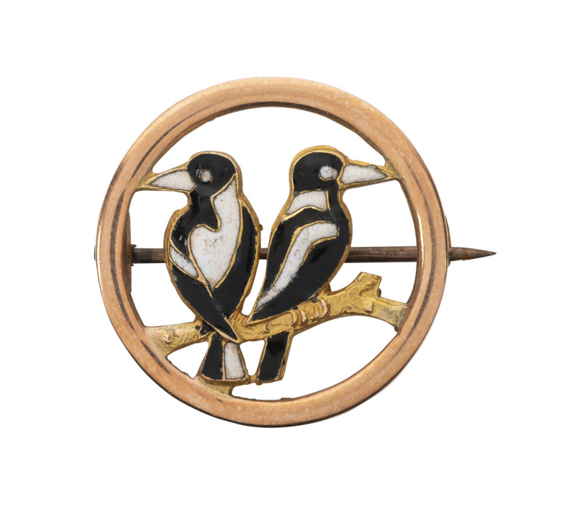 Australian magpie brooch, 9ct rose gold with enamel decoration, early 20th century, attributed to J. C. Taylor, Perth, Western Australia, 2.5cm diameter, 3.75 grams