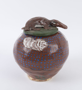 HERMANNSBURG SCHOOL pottery lidded jar with platypus lid, ​22cm high