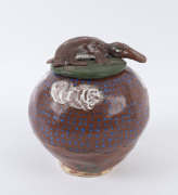 HERMANNSBURG SCHOOL pottery lidded jar with platypus lid, ​22cm high