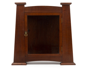 An Australian Arts & Crafts wall display cabinet, fiddleback blackwood, circa 1910, makers stamp on the base (illegible), ​52cm high, 53cm wide, 23cm deep